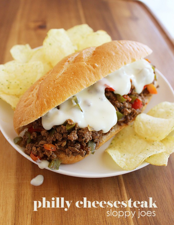 Philly Cheesesteak Sloppy Joes – Try this fun twist on Philly cheesesteaks with bell peppers and a homemade provolone cheese sauce! | thecomfortofcooking.com