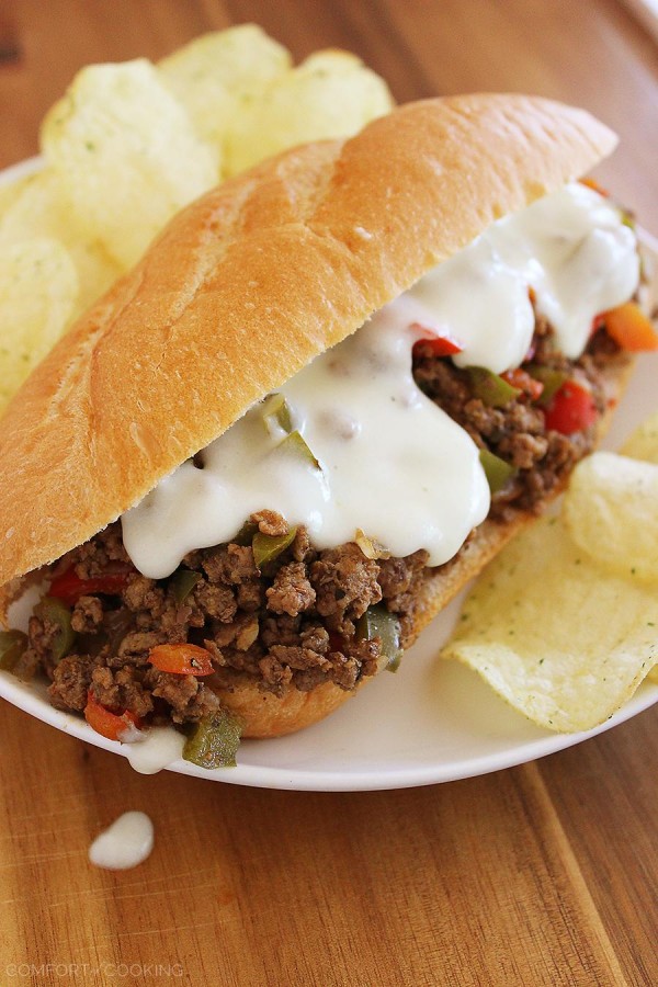 Philly Cheesesteak Sloppy Joes – Try this fun twist on Philly cheesesteaks with bell peppers and a homemade provolone cheese sauce! | thecomfortofcooking.com