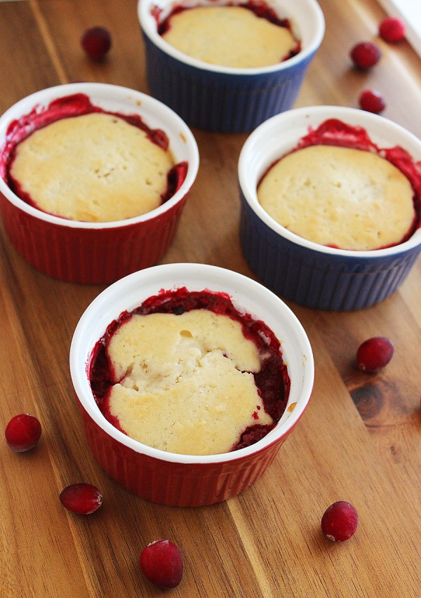 Mini Cranberry Sauce Cobblers – Scoop leftover cranberry sauce/relish into ramekins for easy mini cranberry cobblers. The quick & easy topping is fluffy and cakey! | thecomfortofcooking.com