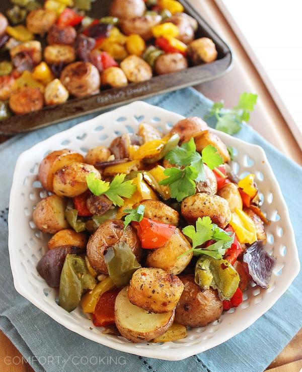 Roasted Chicken Sausage, Peppers and Potatoes – We are addicted to this sausage, potato and pepper dish! It's a healthy, colorful and protein-packed pan full of deliciousness and so easy to make. Just chop, toss and roast. Dinner is done! | thecomfortofcooking.com