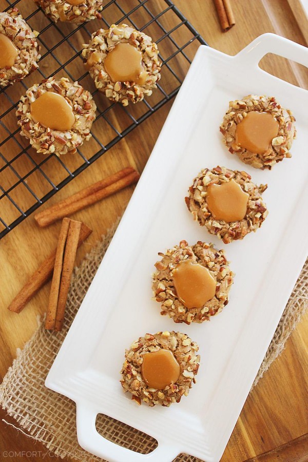 Caramel Spice Thumbprint Cookies – Bake a batch of caramel-filled thumbprint cookies to give to someone special! They're adorable, delicious and easier to make than you may think. Chopped pecans make the perfect pretty coating!| thecomfortofcooking.com