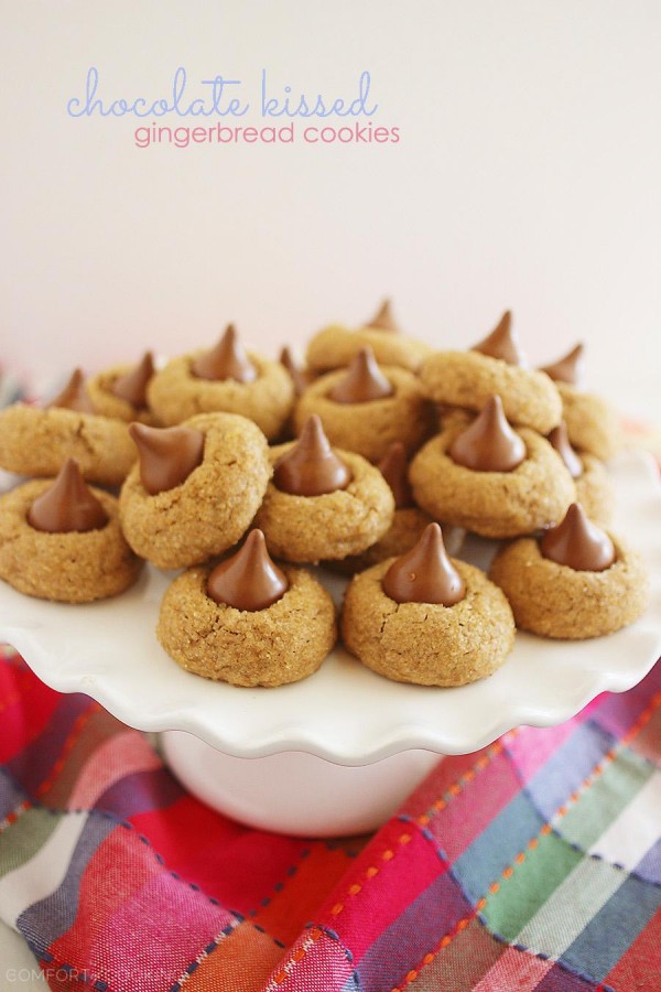 Chocolate Kissed Gingerbread Cookies - With a sparkly sugar coating and a creamy chocolate center, there's nothing not to love about these cookies. Made easily with a cake mix, adorably delicious, and a sweet holiday gift and party treat. | thecomfortofcooking.com