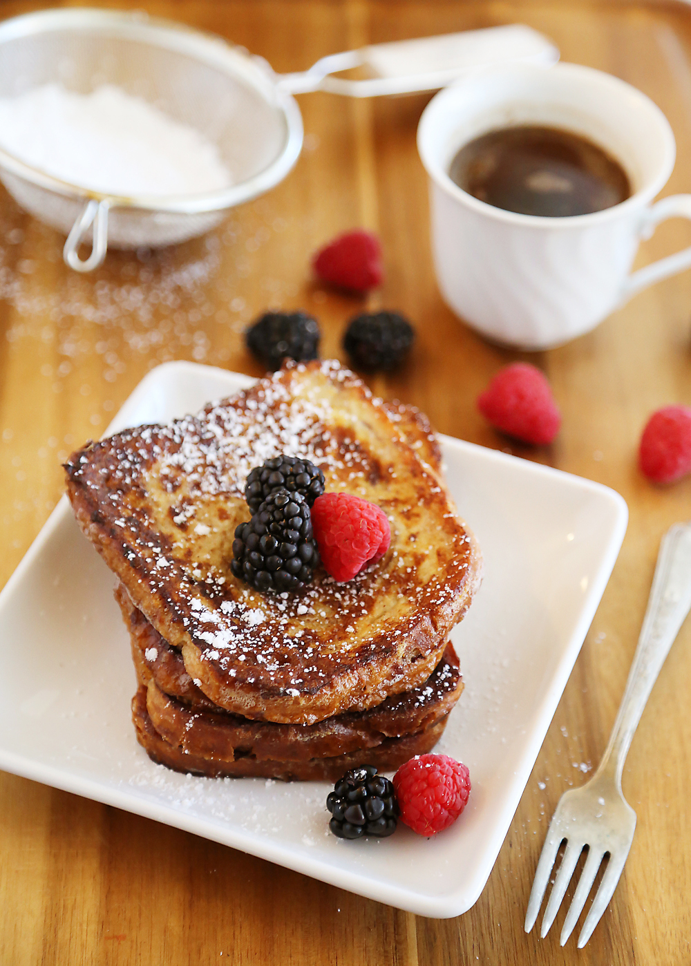 Cinnamon Swirl Bread French Toast – Just 5 ingredients and 10 minutes for this easy, gooey and delicious morning treat. Top with berries! Thecomfortofcooking.com