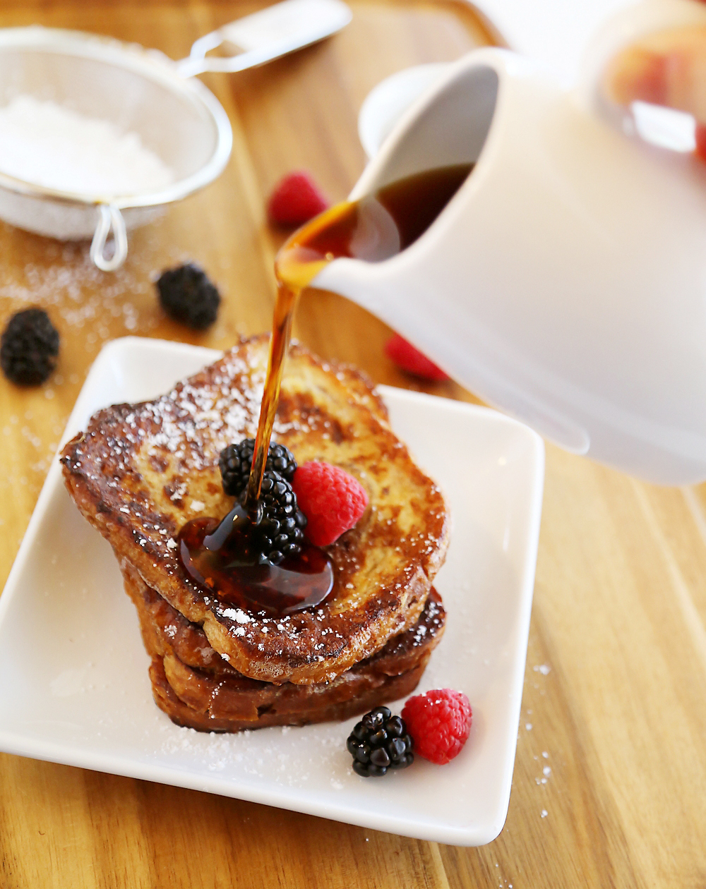 Cinnamon Swirl Bread French Toast – Just 5 ingredients and 10 minutes for this easy, gooey and delicious morning treat. Top with berries! Thecomfortofcooking.com