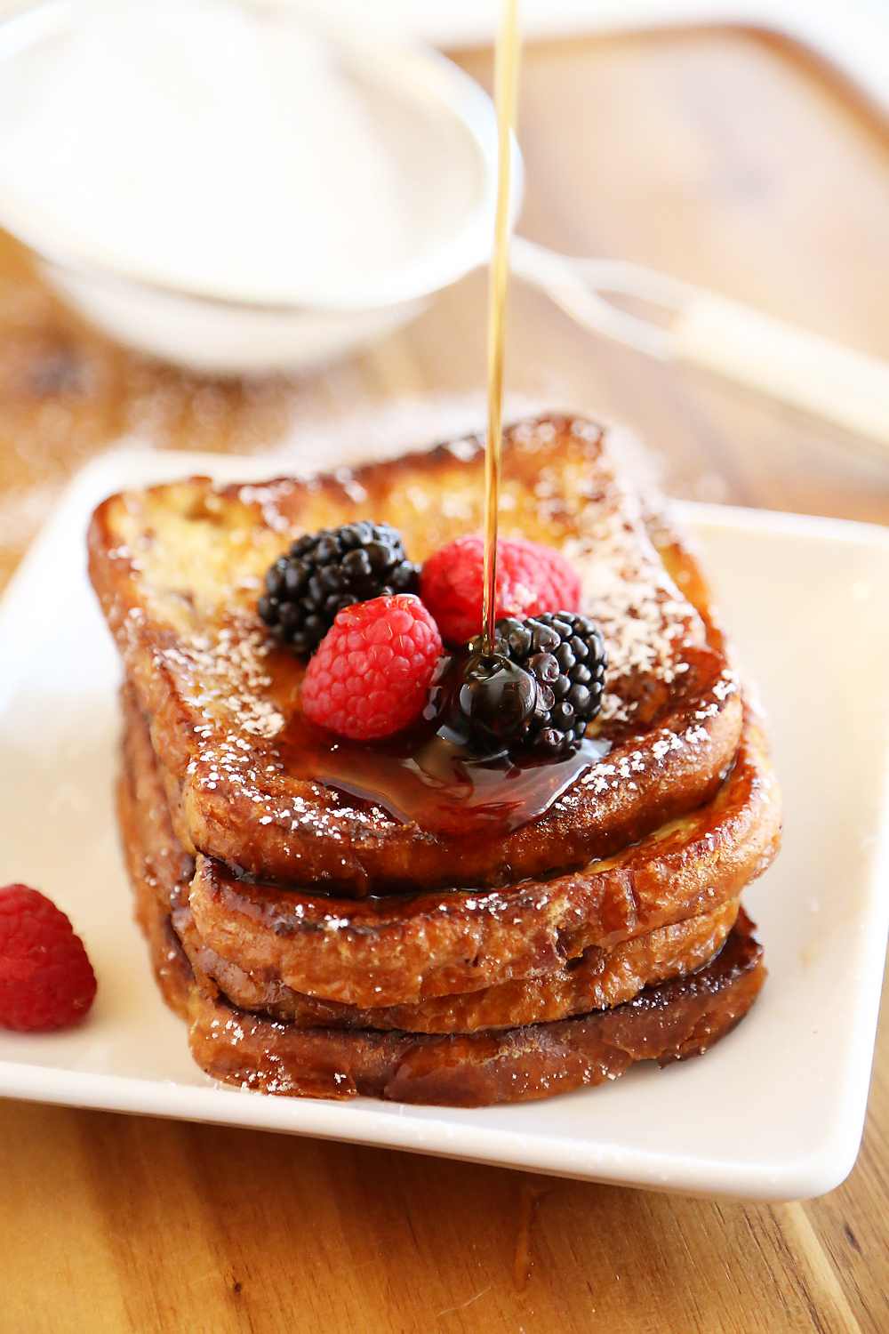 Cinnamon Swirl Bread French Toast – Just 5 ingredients and 10 minutes for this easy, gooey and delicious morning treat. Top with berries! Thecomfortofcooking.com