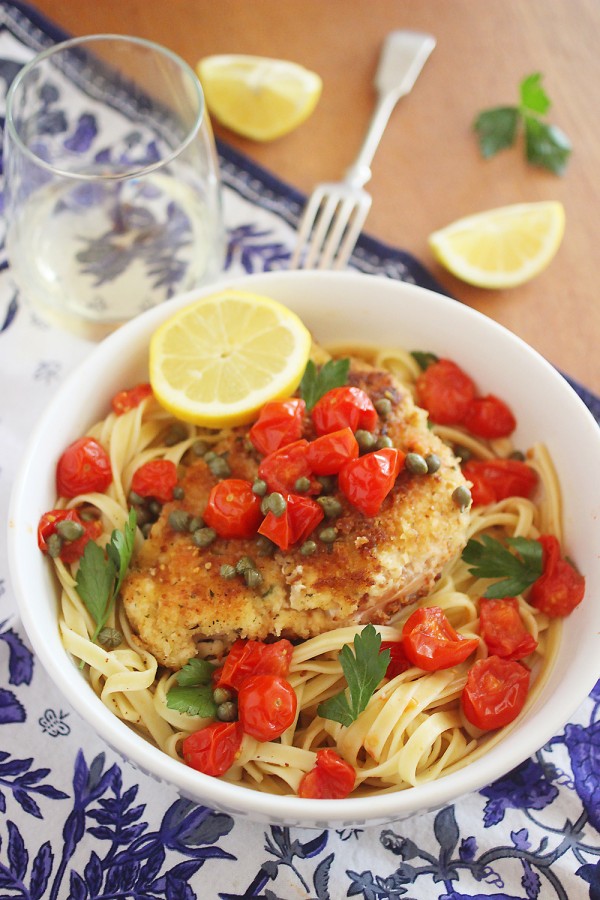 The light, lemony butter-wine sauce and tomatoes make this chicken scallopini easy but elegant, and irresistibly good! | thecomfortofcooking.com