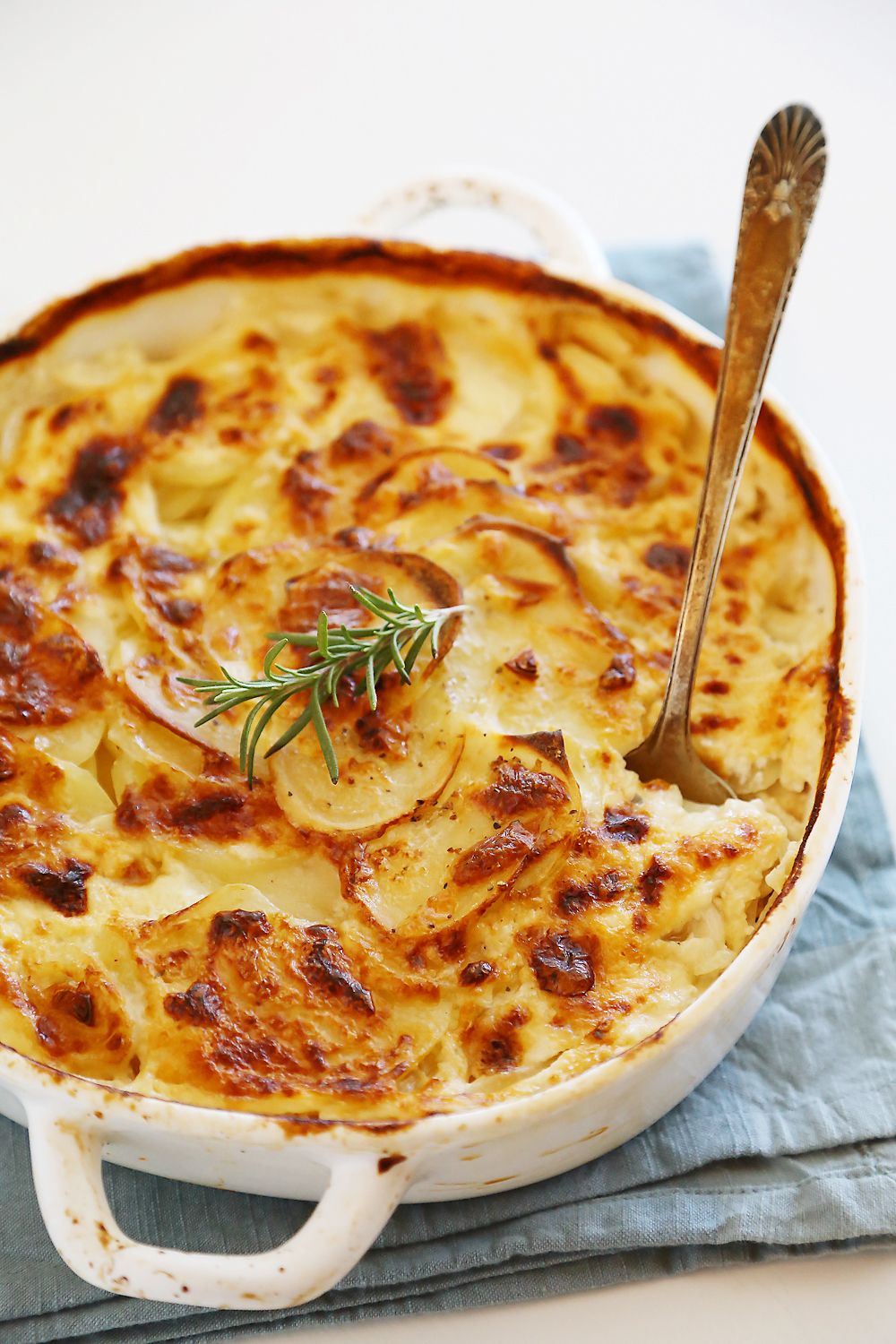 Garlic and Goat Cheese Potato Gratin – The best potato gratin I've ever made, and so easy! Deliciously rich and creamy, with melt-in-your-mouth potatoes and garlic! | thecomfortofcooking.com