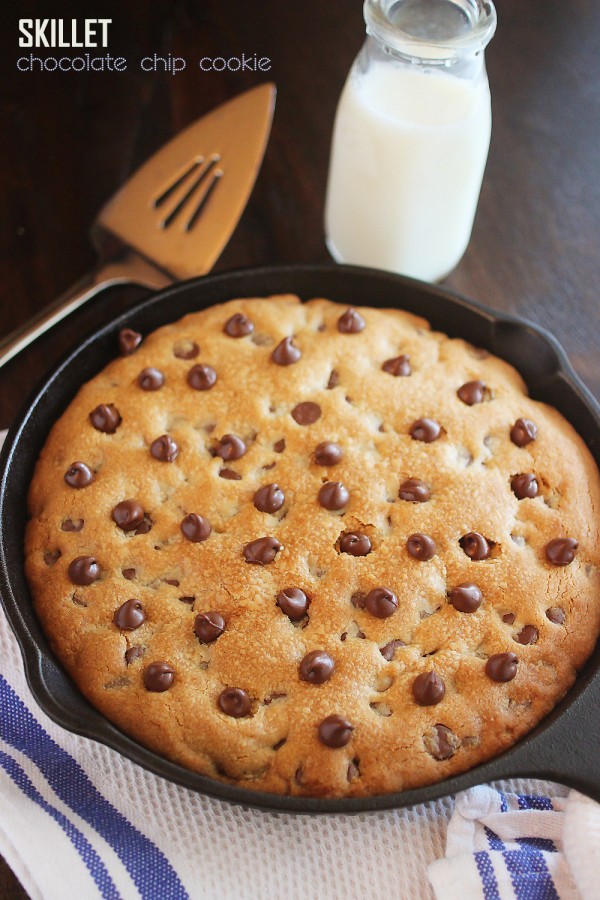 Skillet Chocolate Chip Cookie – This EASY soft, gooey skillet-baked cookie makes lots to share. Top with vanilla ice cream for a truly decadent treat! | thecomfortofcooking.com