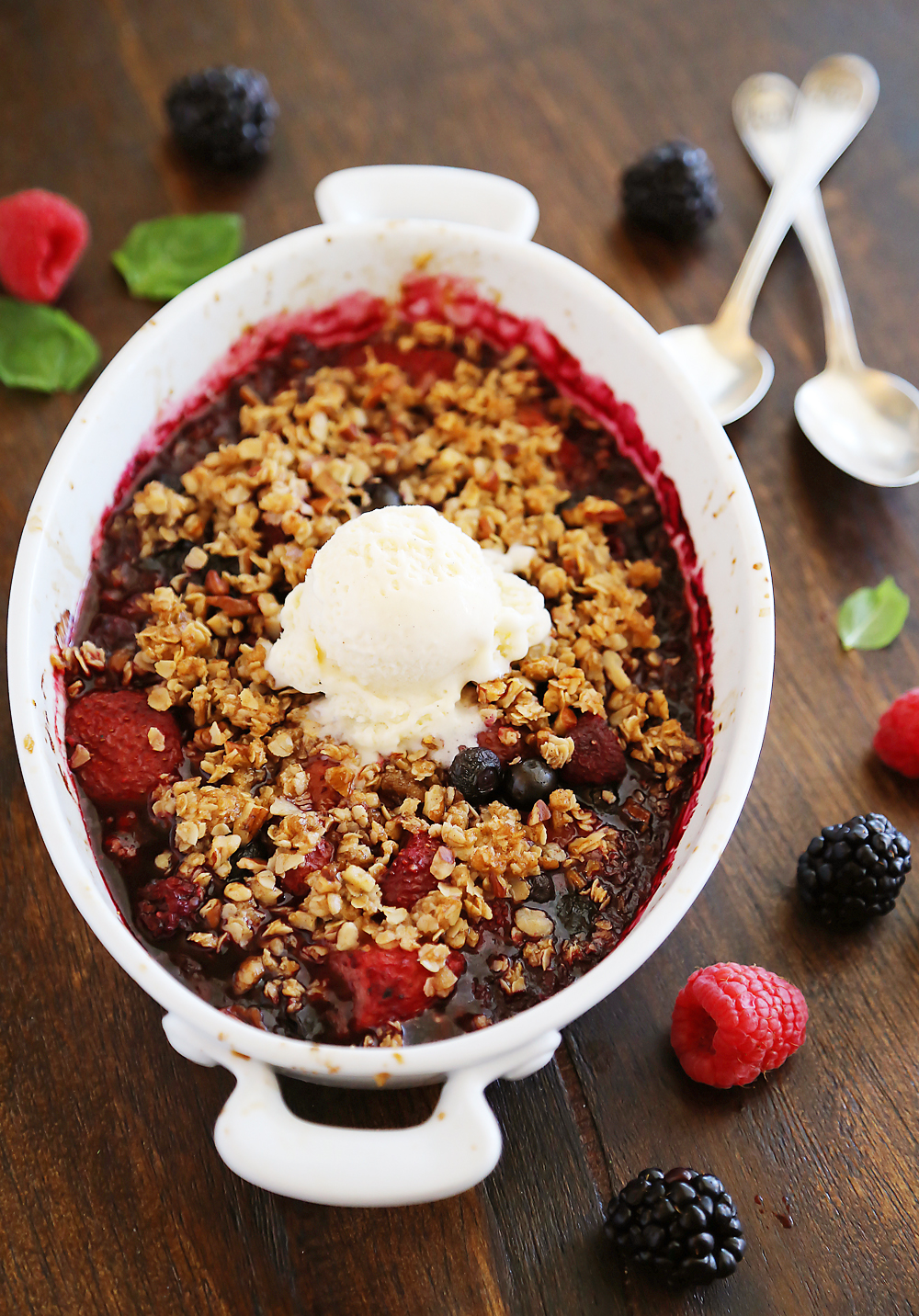 Warm Berry Crisp for Two – Small batch spin on a classic mixed berry crisp. Serve with vanilla ice cream or whipped cream! Thecomfortofcooking.com