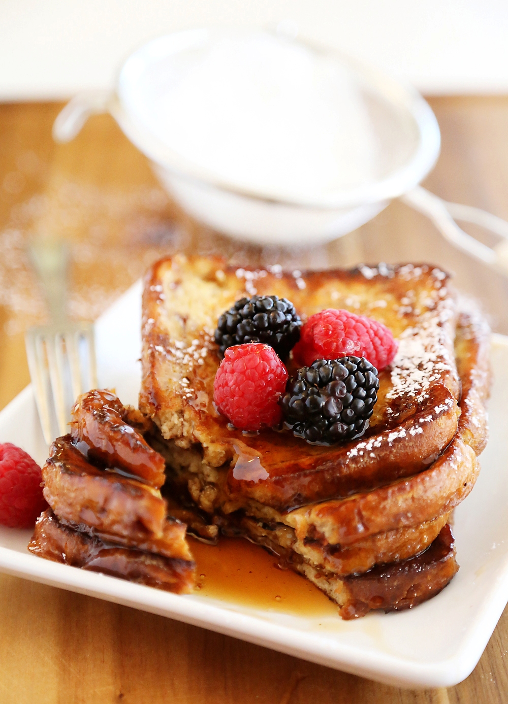 Cinnamon Swirl Bread French Toast – Just 5 ingredients and 10 minutes for this easy, gooey and delicious morning treat. Top with berries! Thecomfortofcooking.com