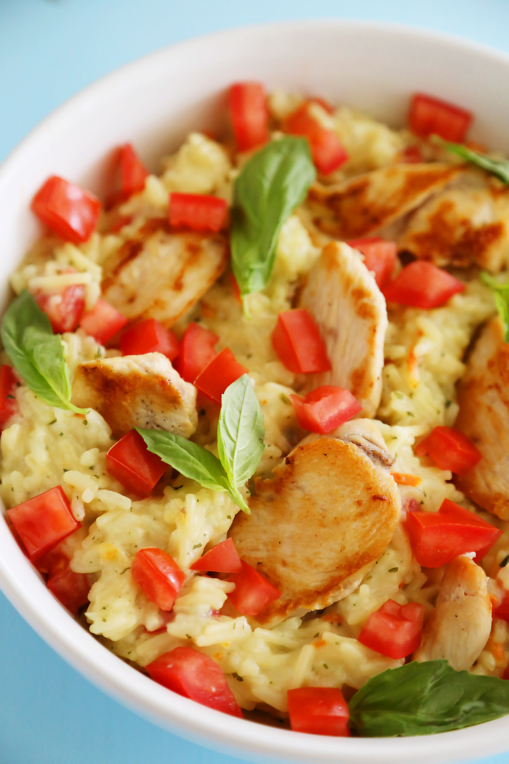 Creamy Bruschetta Chicken and Rice – Hearty, healthy and super quick for family dinners. This recipe is a keeper! | thecomfortofcooking.com