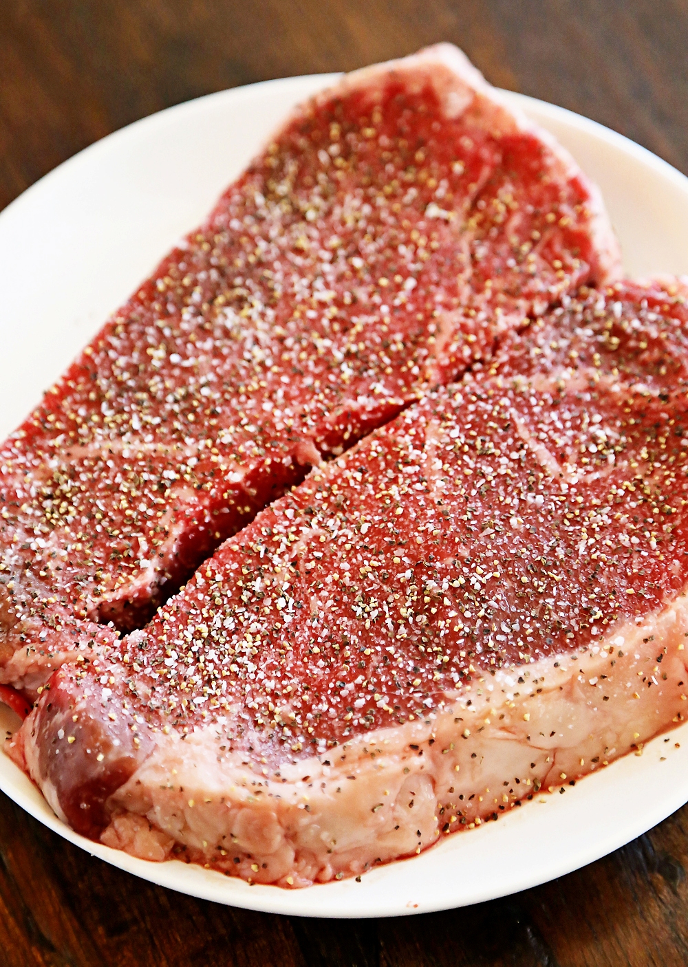 Skillet Steaks with Gorgonzola Herb Butter – Best steak we’ve ever cooked at home! Sizzle in a skillet + top with a creamy gorgonzola herb butter. | thecomfortofcooking.com