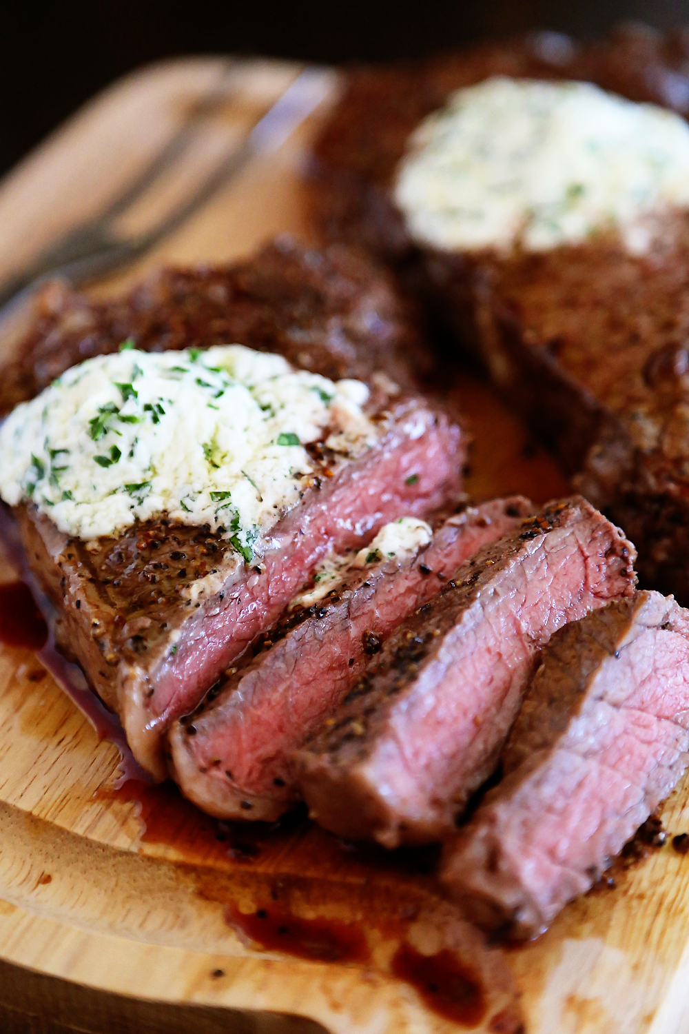 Skillet Steaks with Gorgonzola Herb Butter – Best steak we’ve ever cooked at home! Sizzle in a skillet + top with a creamy gorgonzola herb butter. | thecomfortofcooking.com