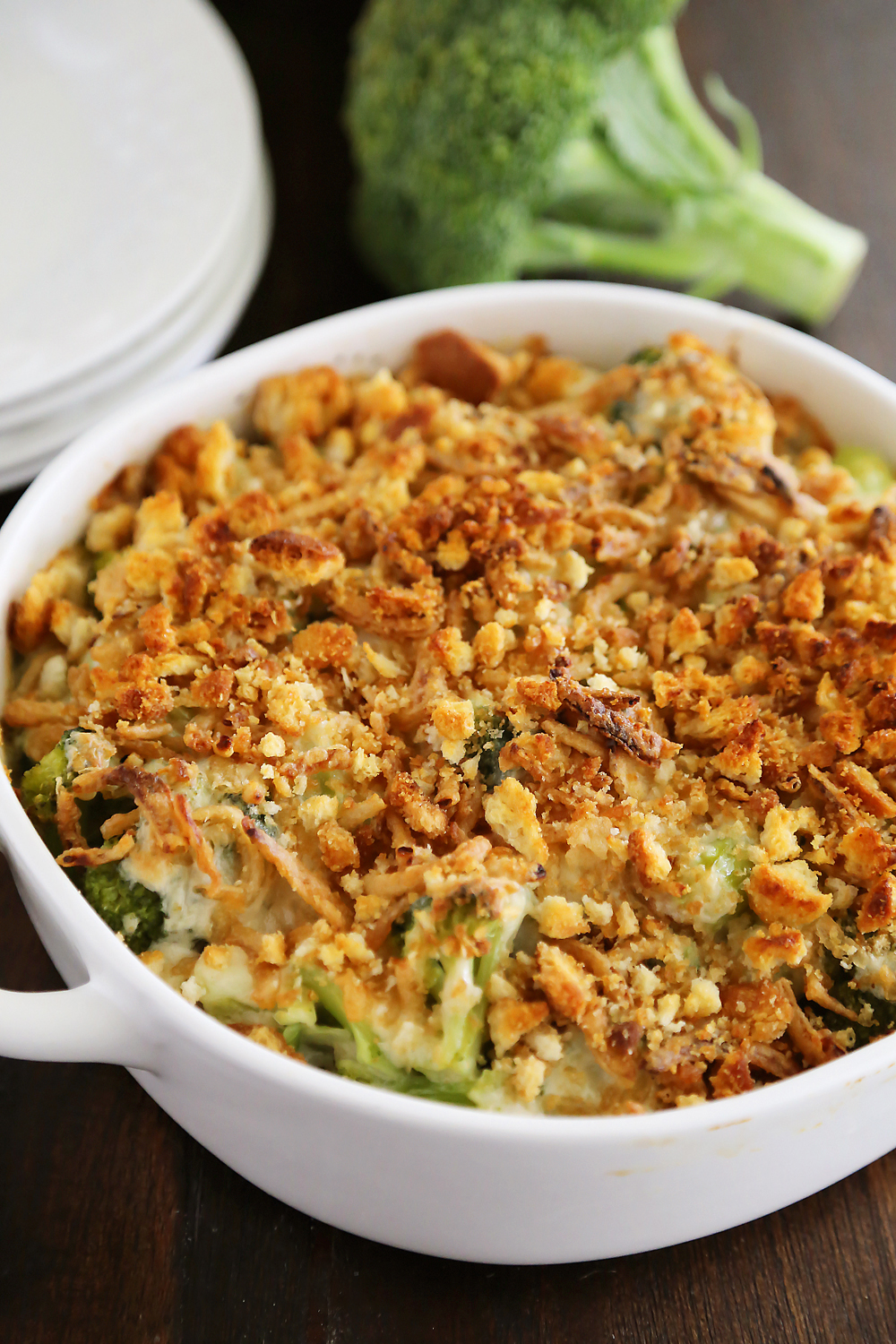 Broccoli Cheddar Gratin with Crispy Onions – Classic, easy broccoli and cheddar casserole topped with crushed croutons and crispy fried onions. Thecomfortofcooking.com