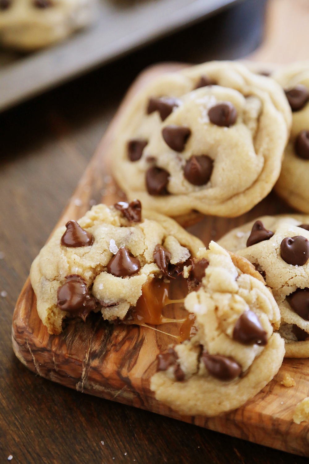 Sea Salt Caramel Chocolate Chip Cookies – Super soft, chewy, easy to make and irresistibly gooey! Thecomfortofcooking.com