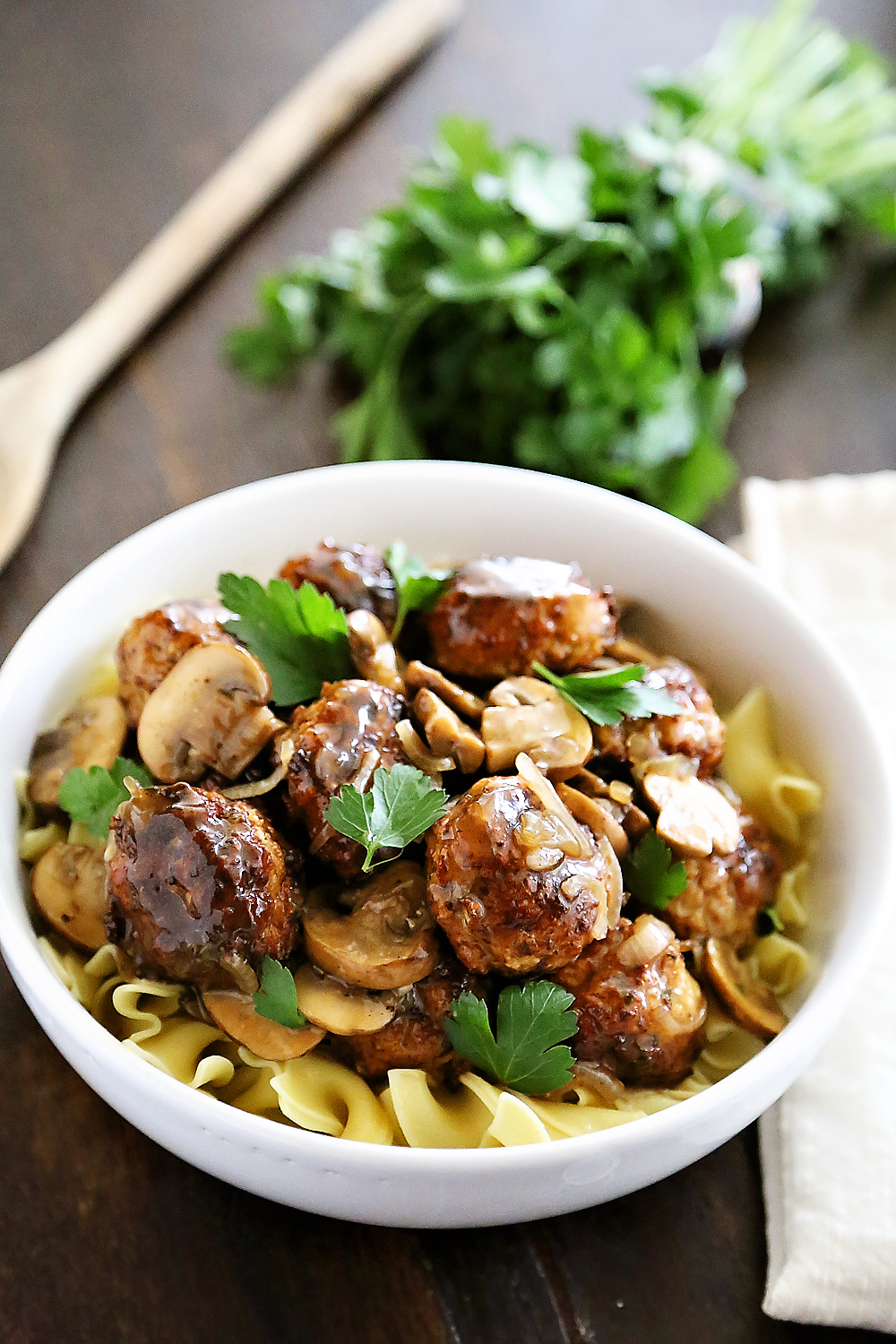 Chicken Marsala Meatballs – So tender and flavorful! Crispy, juicy meatballs with mushrooms in a tangy Marsala sauce. Thecomfortofcooking.com