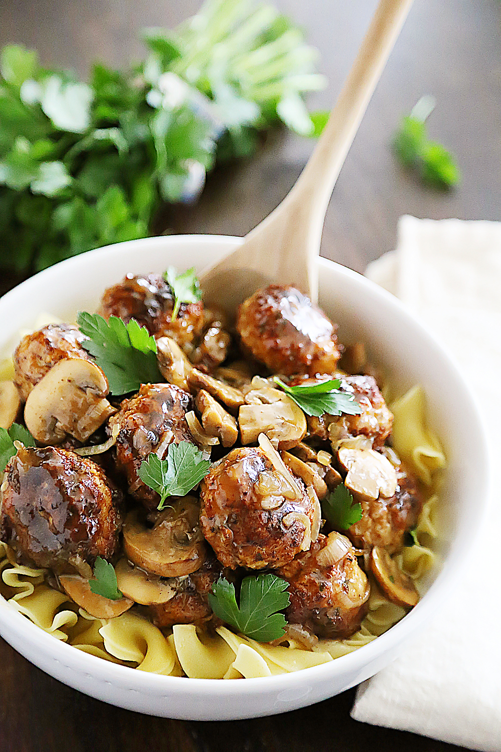 Chicken Marsala Meatballs – So tender and flavorful! Crispy, juicy meatballs with mushrooms in a tangy Marsala sauce. Thecomfortofcooking.com