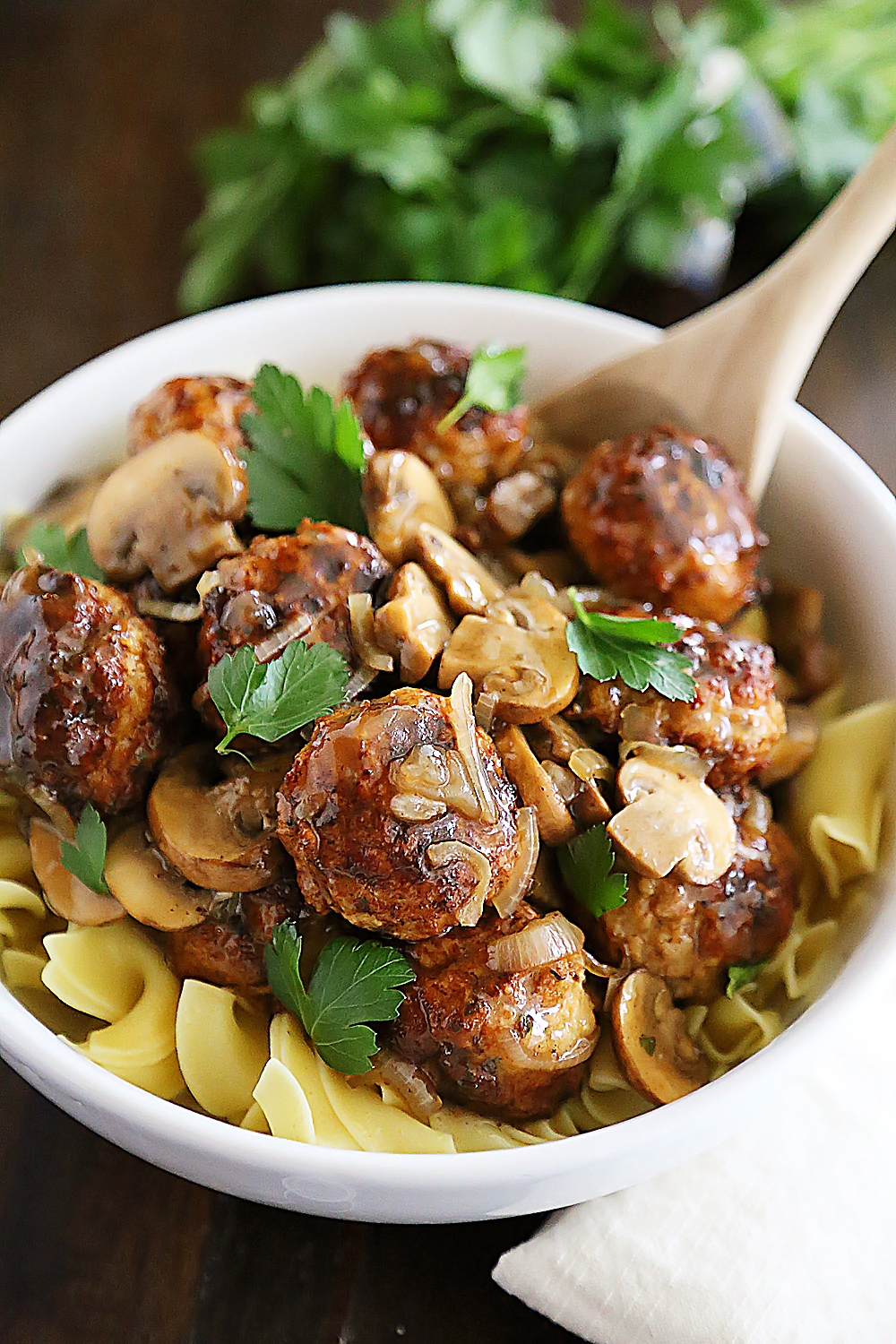 Chicken Marsala Meatballs – So tender and flavorful! Crispy, juicy meatballs with mushrooms in a tangy Marsala sauce. Thecomfortofcooking.com