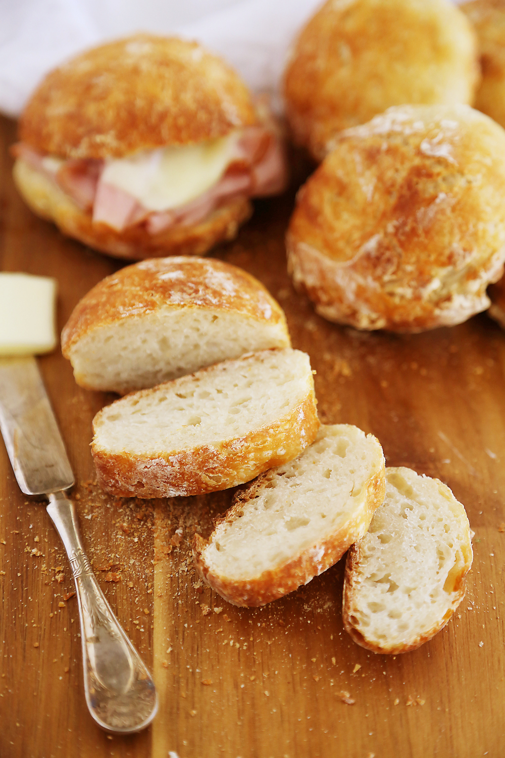 No-Knead Crusty Artisan Mini Loaves – So crusty, fluffy, and EASY! Just 3 ingredients and 5 minutes for these homemade loaves. thecomfortofcooking.com 