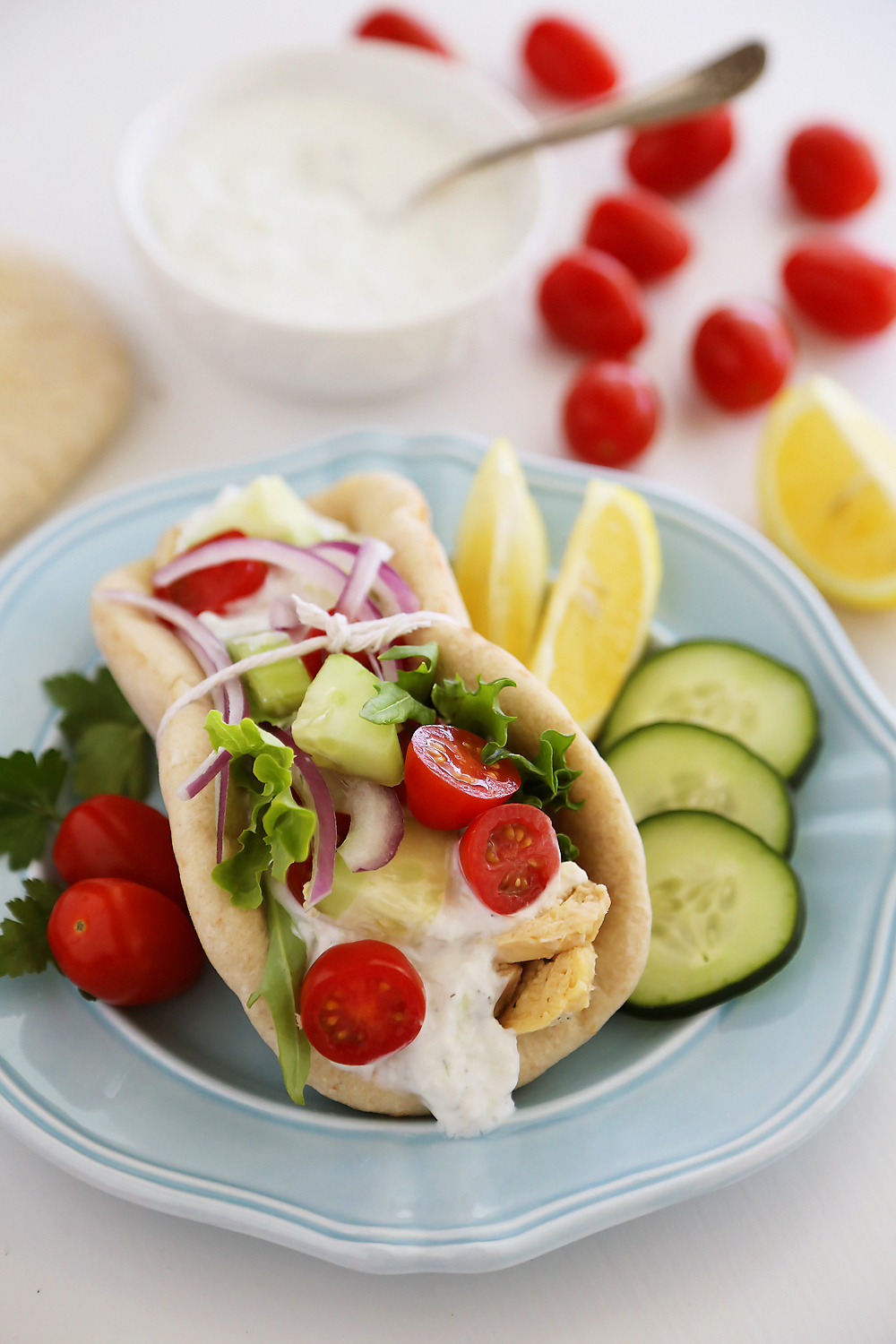 Slow Cooker Chicken Gyros with Tzatziki Sauce - Just like your favorite Greek takeout, but 10x more fresh and flavorful! Thecomfortofcooking.com