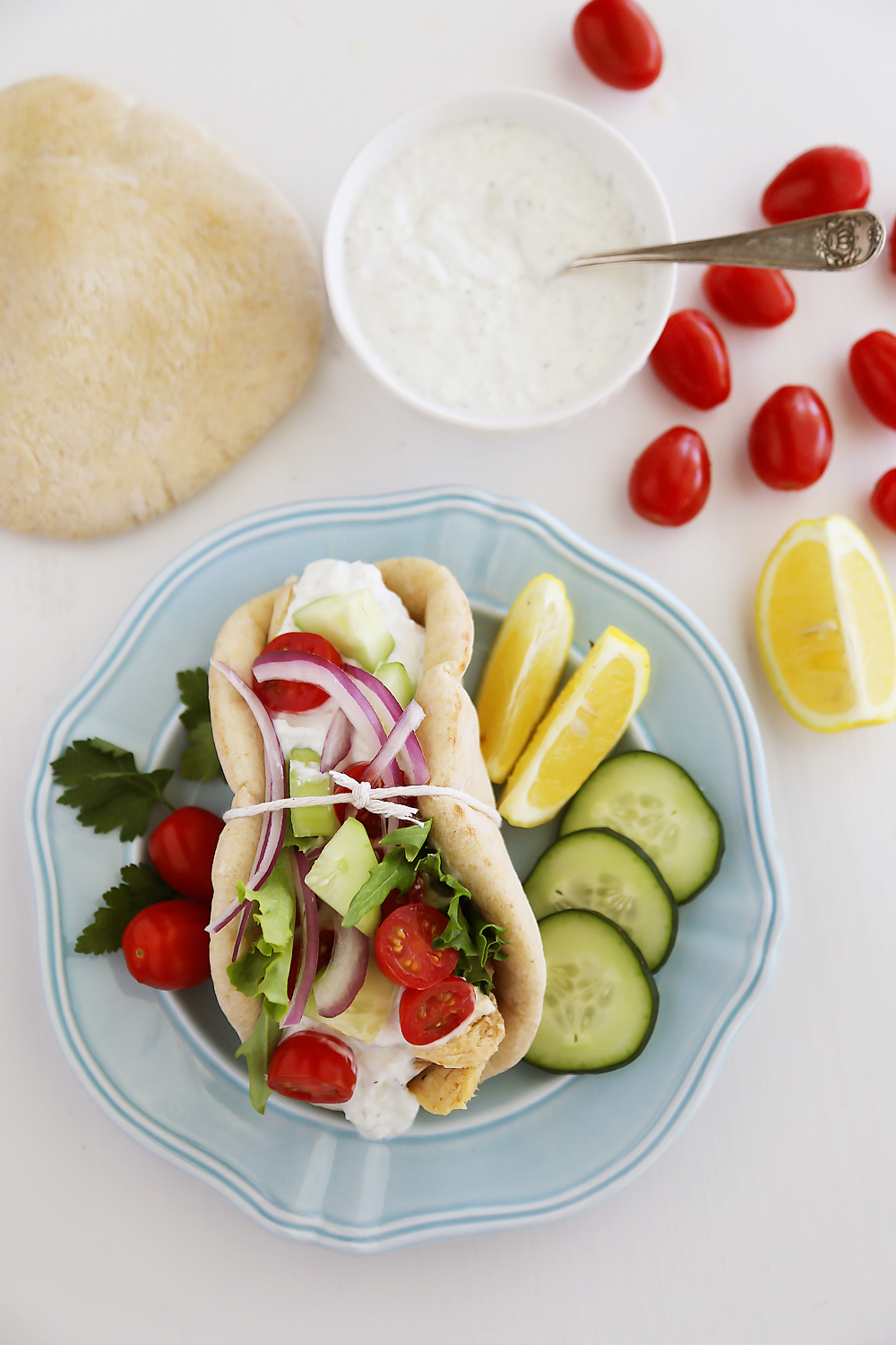 Slow Cooker Chicken Gyros with Tzatziki Sauce - Just like your favorite Greek takeout, but 10x more fresh and flavorful! Thecomfortofcooking.com