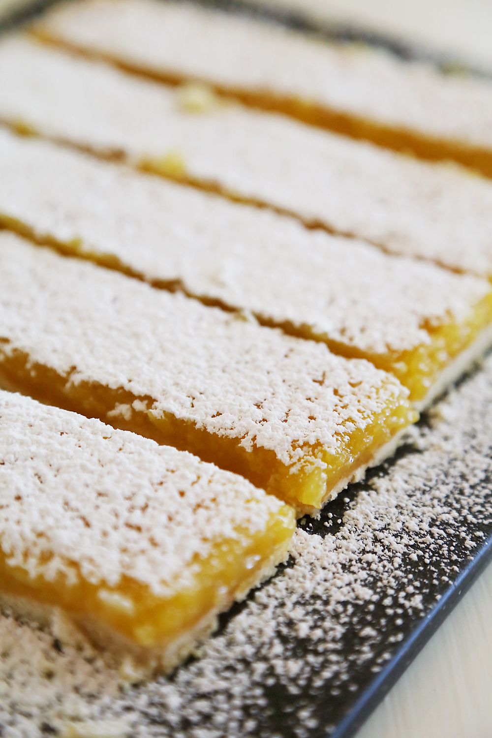 Best Ever Lemon Bars - Made easily 100% from scratch with all-natural ingredients. So easy, sweet and tangy! thecomfortofcooking.com