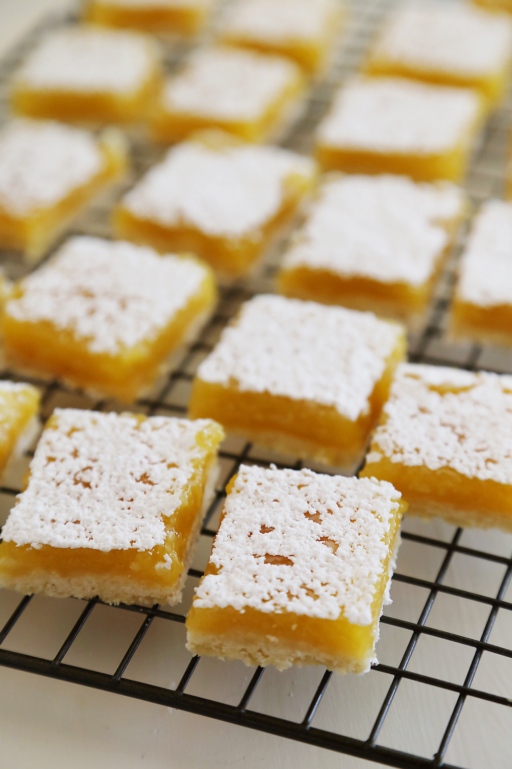 Best Ever Lemon Bars - Made easily 100% from scratch with all-natural ingredients. So easy, sweet and tangy! thecomfortofcooking.com