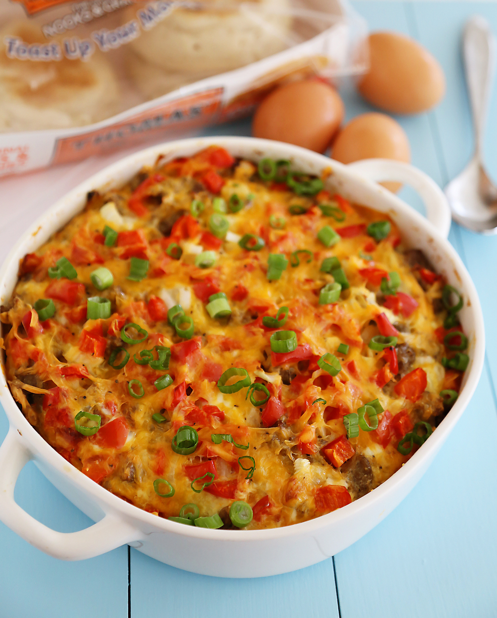 English Muffin Sausage, Egg and Cheese Breakfast Casserole – So delicious and easy! Topped with salty sausage, scrambled eggs and cheddar. thecomfortofcooking.com