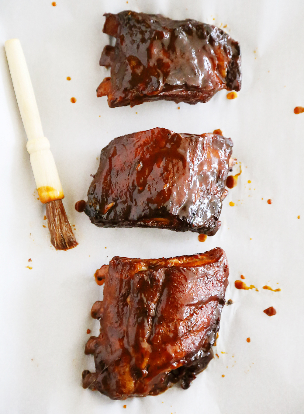 Slow Cooker Root Beer Baby Back Ribs - Tangy, tender and fall-off-the-bone good! Just 3 ingredients and made easily in your slow cooker. Thecomfortofcooking.com