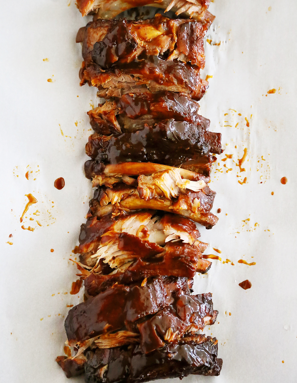 Slow Cooker Root Beer Baby Back Ribs - Tangy, tender and fall-off-the-bone good! Just 3 ingredients and made easily in your slow cooker. Thecomfortofcooking.com