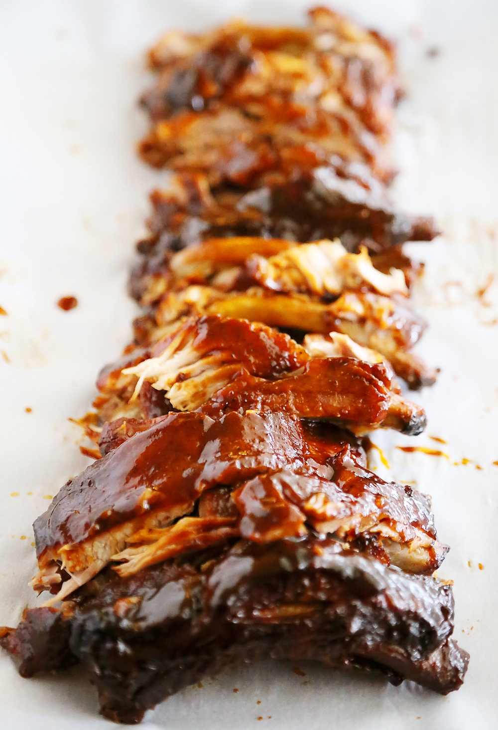 Slow Cooker Root Beer Baby Back Ribs - Tangy, tender and fall-off-the-bone good! Just 3 ingredients and made easily in your slow cooker. Thecomfortofcooking.com