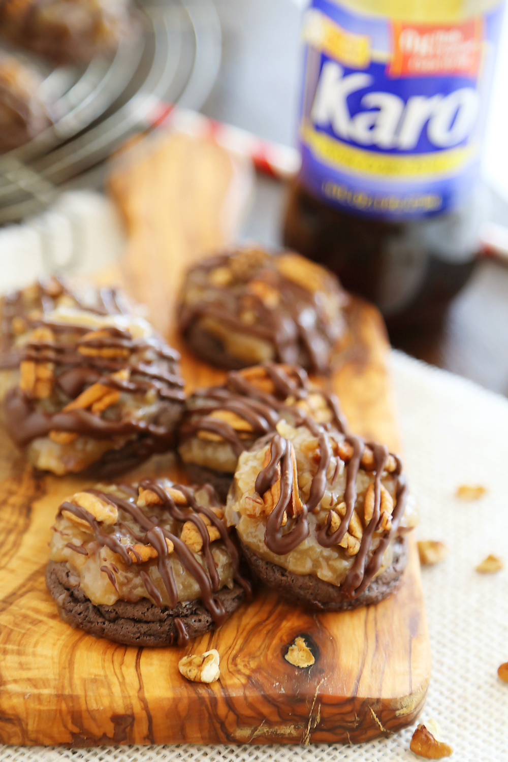 Gooey German Chocolate Cake Cookies - Rich, chocolaty cookies topped with decadent caramel-coated pecans, coconut and chocolate chips! Thecomfortofcooking.com