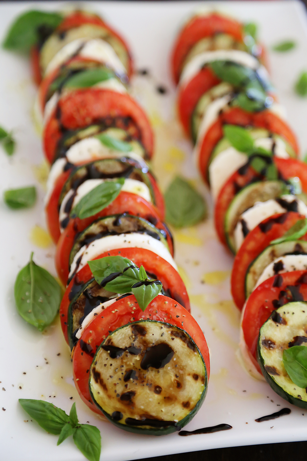 Grilled Zucchini Caprese Salad - Colorful, healthy, quick and easy. Serve alongside your favorite grilled meats and fish! Thecomfortofcooking.com
