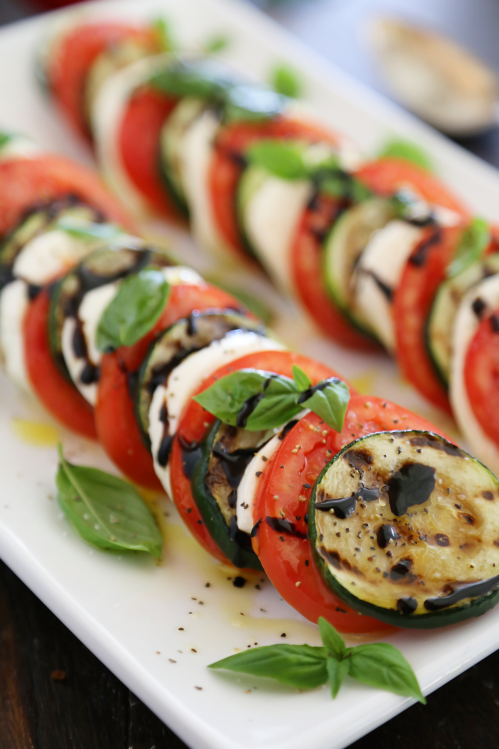 Grilled Zucchini Caprese Salad - Colorful, healthy, quick and easy. Serve alongside your favorite grilled meats and fish! Thecomfortofcooking.com