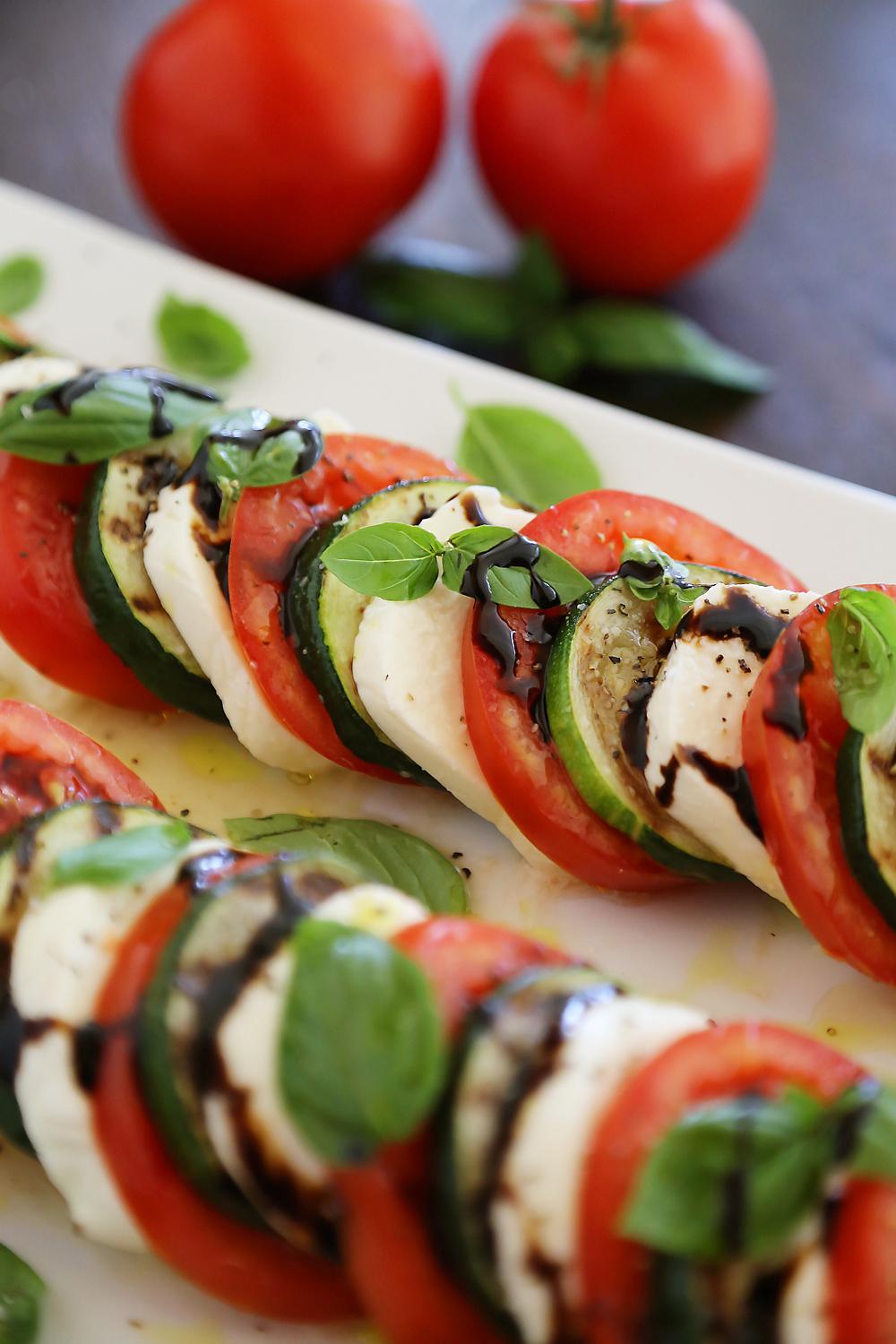 Grilled Zucchini Caprese Salad - Colorful, healthy, quick and easy. Serve alongside your favorite grilled meats and fish! Thecomfortofcooking.com