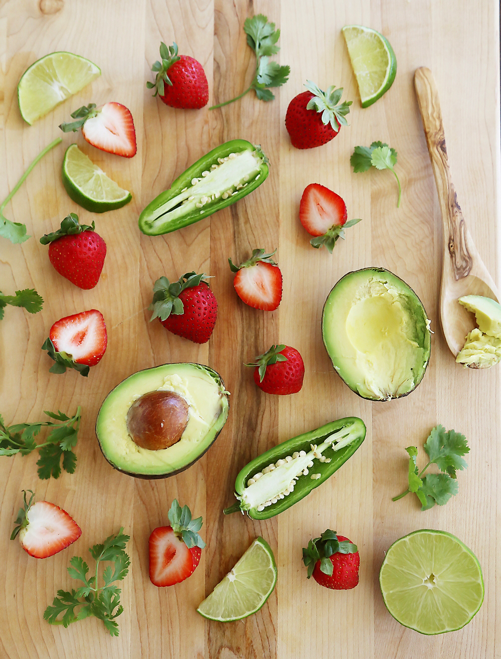 Strawberry Jalapeño Avocado Salsa - The perfect summer salsa! Serve with tortilla chips for snacking, or on the side of grilled meats, steak and fish. thecomfortofcooking.com