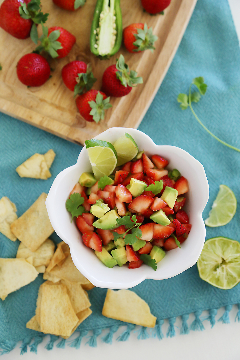 Strawberry Jalapeño Avocado Salsa - The perfect summer salsa! Serve with tortilla chips for snacking, or on the side of grilled meats, steak and fish. thecomfortofcooking.com