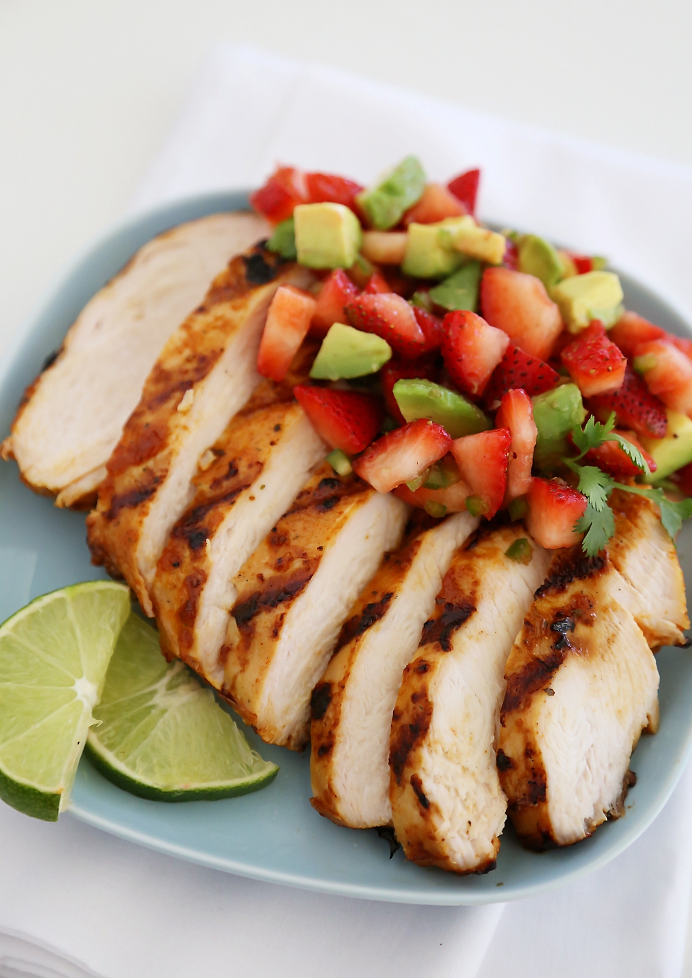 Strawberry Jalapeño Avocado Salsa - The perfect summer salsa! Serve with tortilla chips for snacking, or on the side of grilled meats, steak and fish. thecomfortofcooking.com