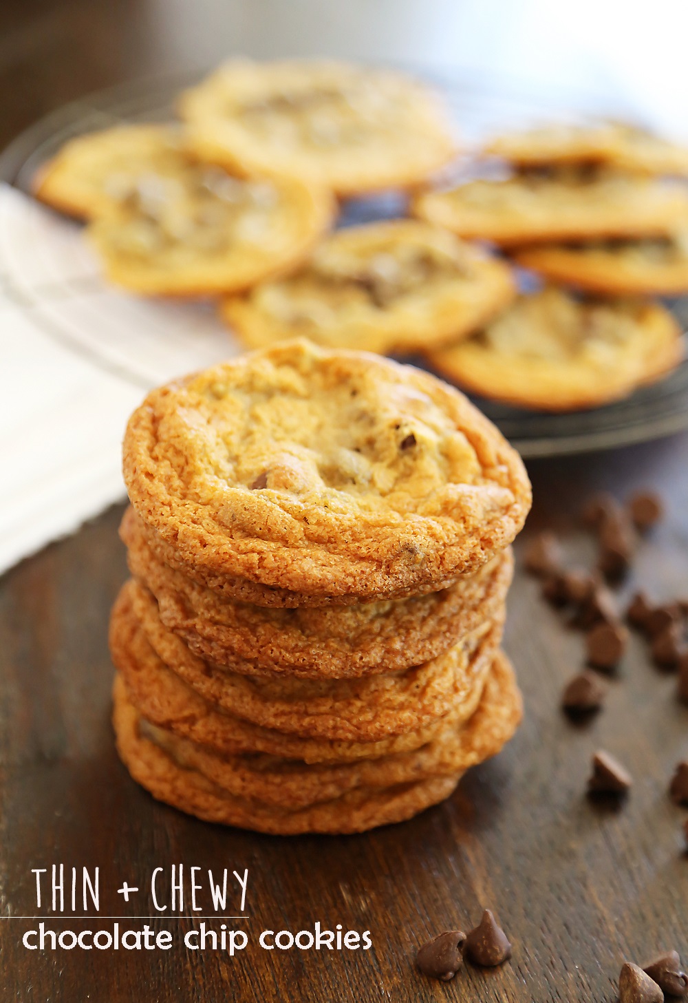 Thin and Chewy Chocolate Chip Cookies – Super buttery, chewy and irresistibly easy. Bake up a batch today! thecomfortofcooking.com