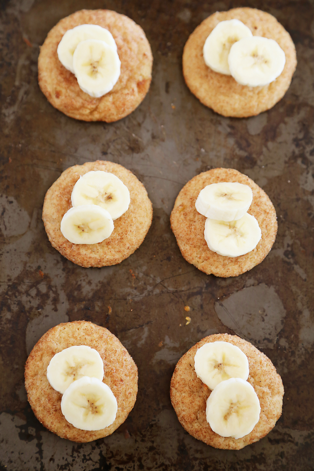 Banana Snickerdoodles – Leftover bananas? Bake these super soft, chewy cinnamon spiced snickerdoodles with sweet banana flavor! thecomfortofcooking.com