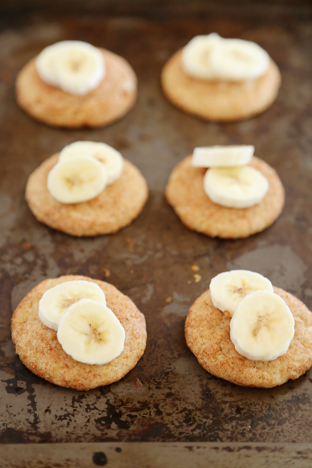 Banana Snickerdoodles – Leftover bananas? Bake these super soft, chewy cinnamon spiced snickerdoodles with sweet banana flavor! thecomfortofcooking.com