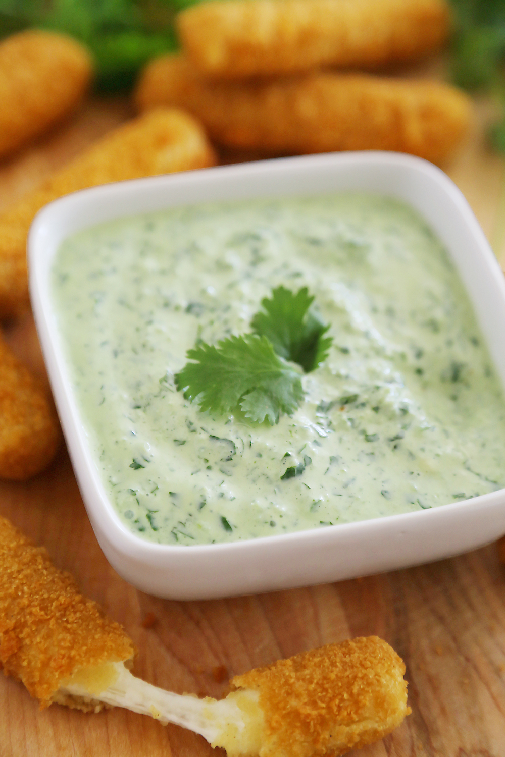 Creamy Cilantro Jalapeño Sauce - Cool, creamy + EASY blender sauce with fresh cilantro and zesty jalapeno! Thecomfortofcooking.com