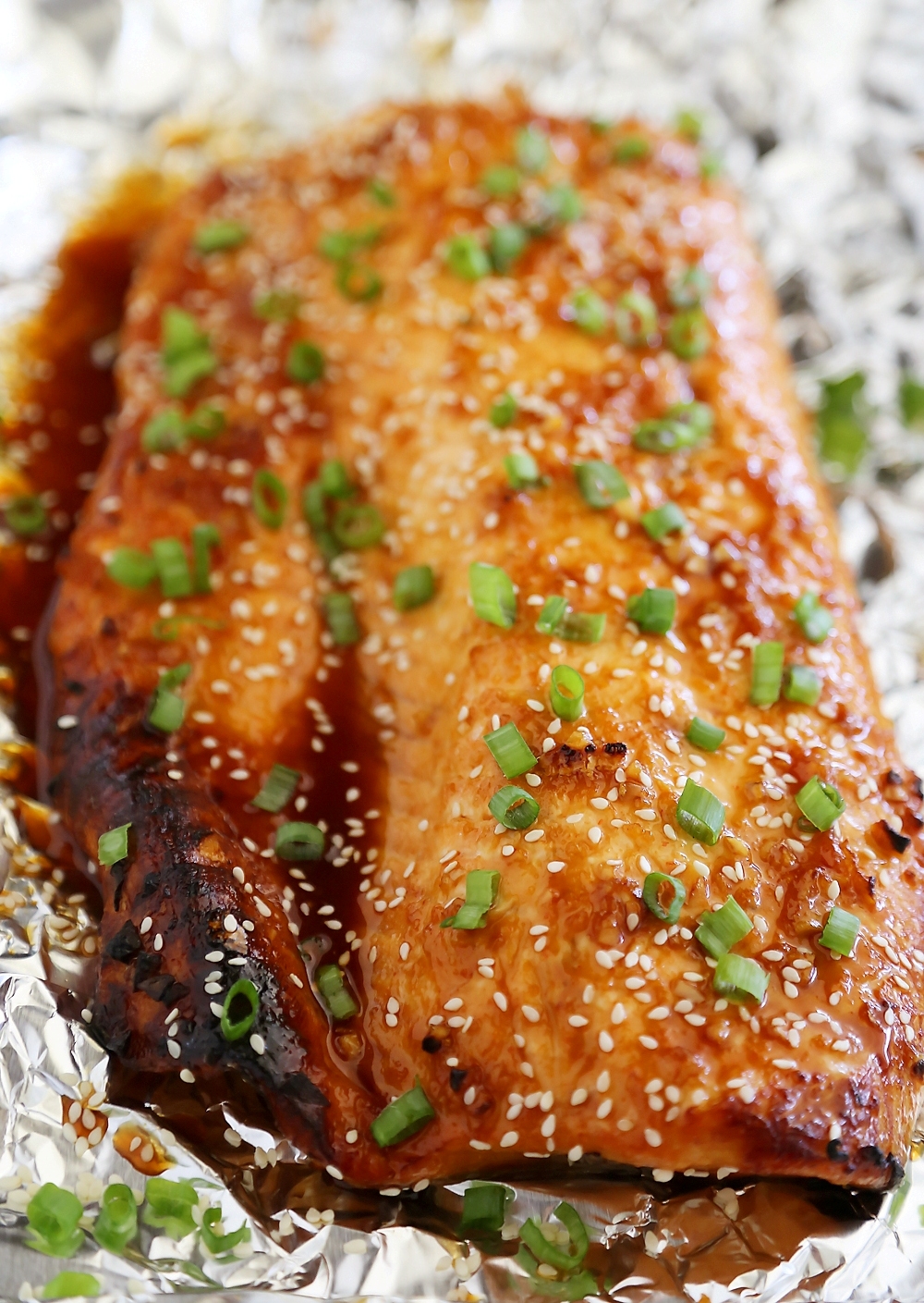 Honey-Soy Asian Salmon in Foil – The most tender, flavorful salmon I've ever tasted – and SO easy! thecomfortofcooking.com