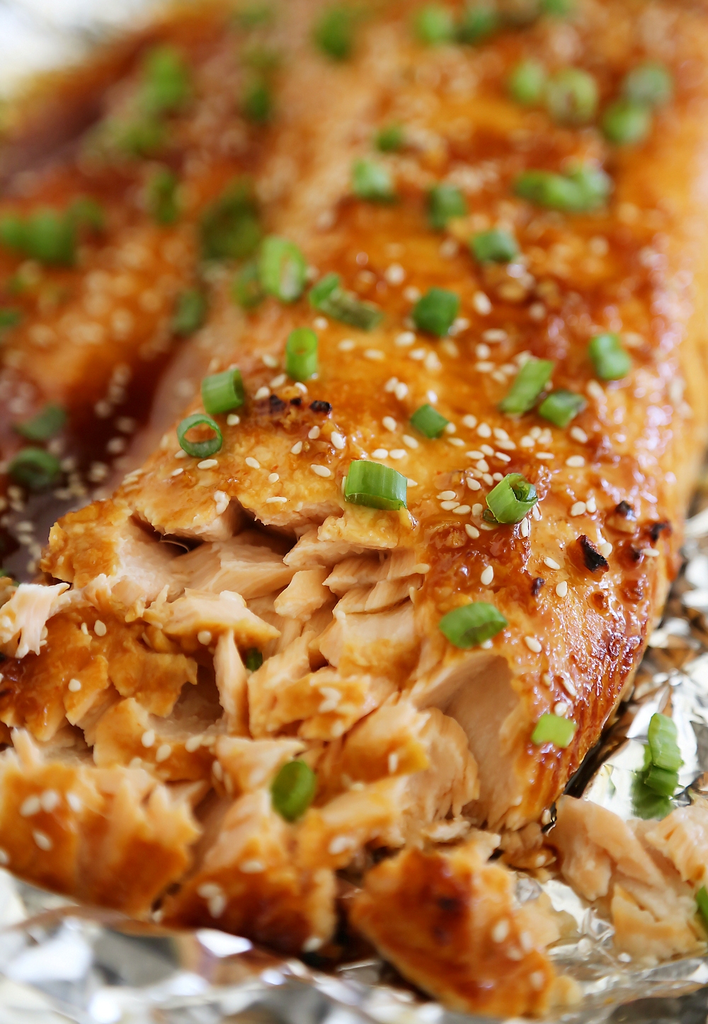 Honey-Soy Asian Salmon in Foil – The most tender, flavorful salmon I've ever tasted – and SO easy! thecomfortofcooking.com