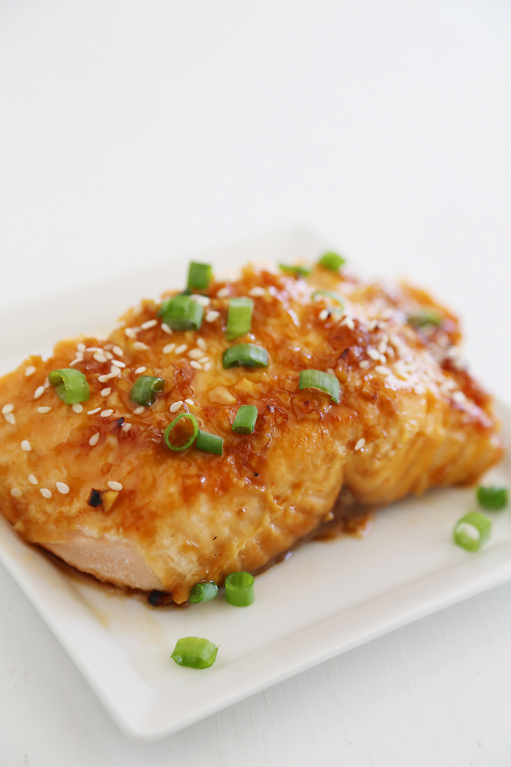 Honey-Soy Asian Salmon in Foil – The most tender, flavorful salmon I've ever tasted – and SO easy! thecomfortofcooking.com