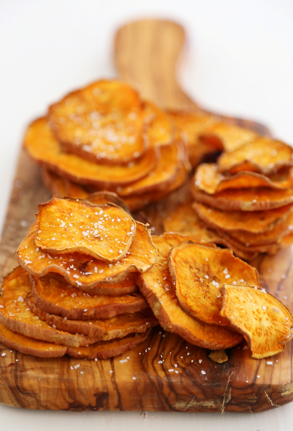 Baked Salt + Vinegar Sweet Potato Chips - Extra crispy, tangy sweet potato chips with just 3 ingredients! thecomfortofcooking.com