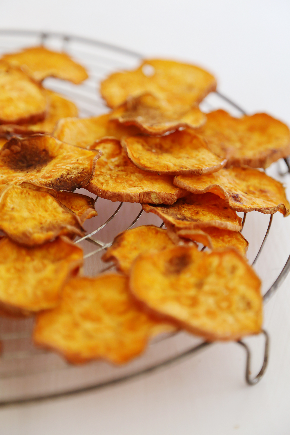 Baked Salt + Vinegar Sweet Potato Chips - Extra crispy, tangy sweet potato chips with just 3 ingredients! thecomfortofcooking.com