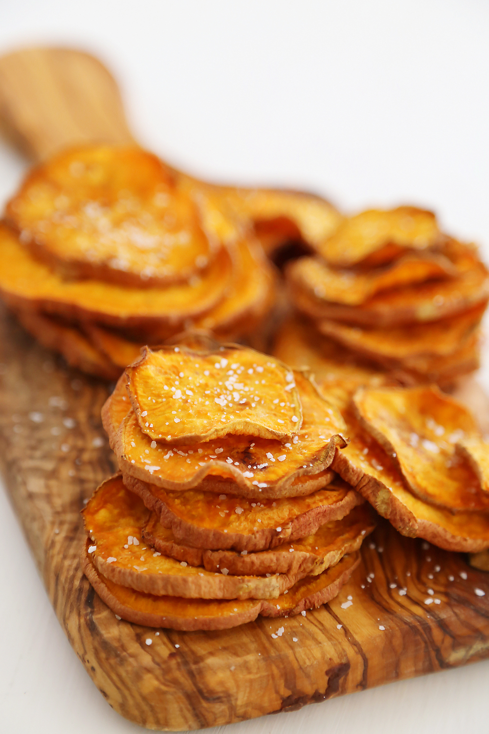 Baked Salt + Vinegar Sweet Potato Chips - Extra crispy, tangy sweet potato chips with just 3 ingredients! thecomfortofcooking.com