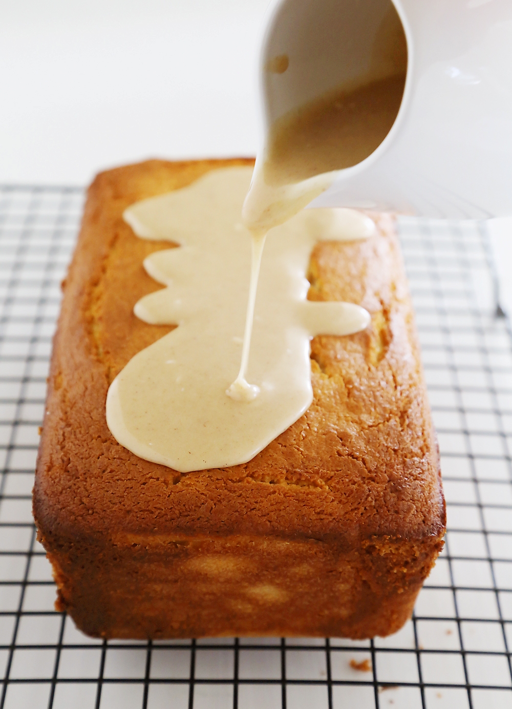 Vanilla Ricotta Pound Cake with Maple Glaze - Super moist, buttery vanilla pound cake with a spiced maple-cinnamon glaze. Thecomfortofcooking.com