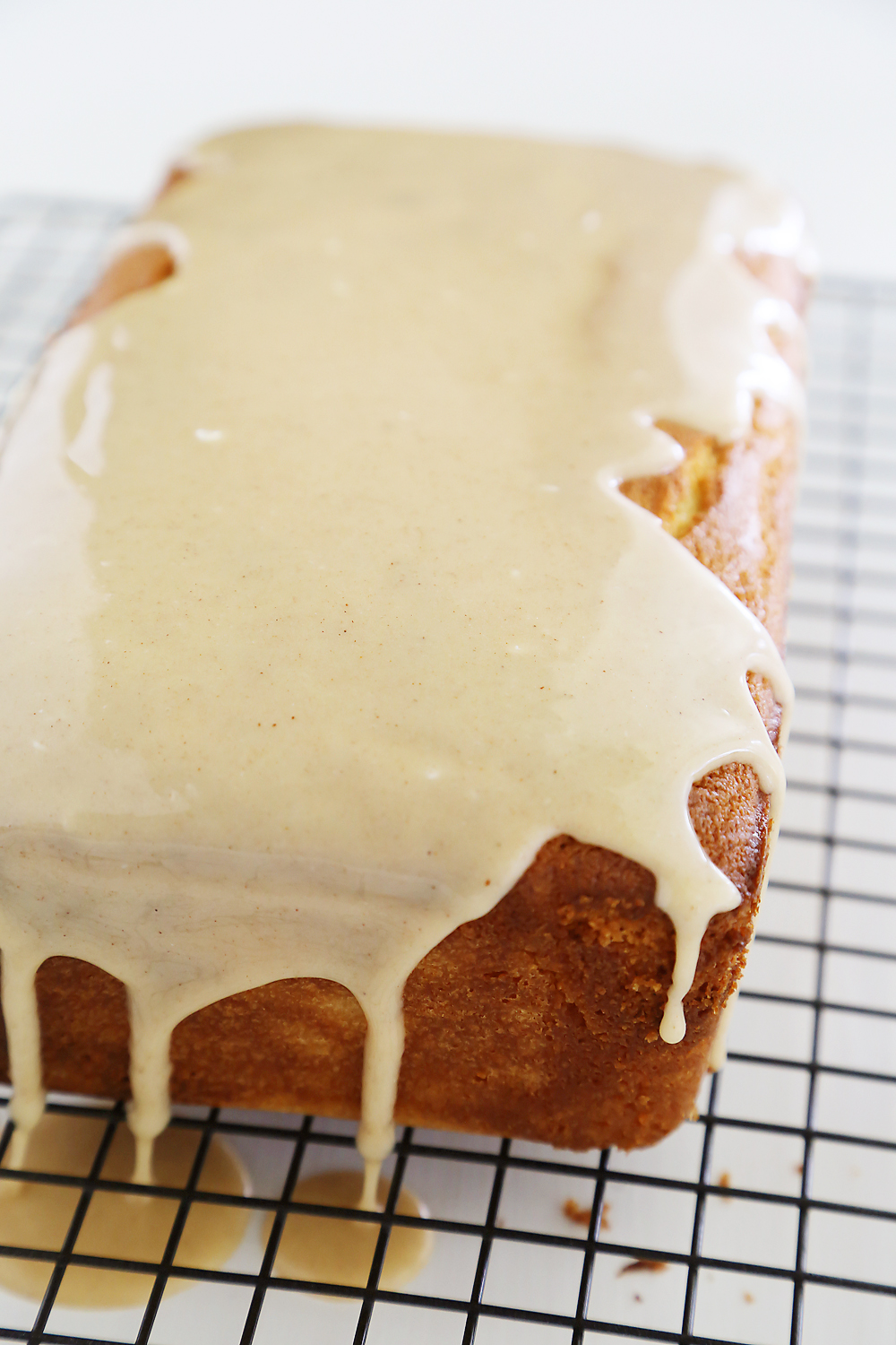 Vanilla Ricotta Pound Cake with Maple Glaze - Super moist, buttery vanilla pound cake with a spiced maple-cinnamon glaze. Thecomfortofcooking.com